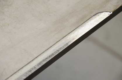 Continuously adjustable bevel angle between 0 and 90 degrees: